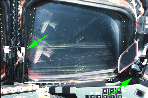 STS-3_window_shade_retainers_arrows